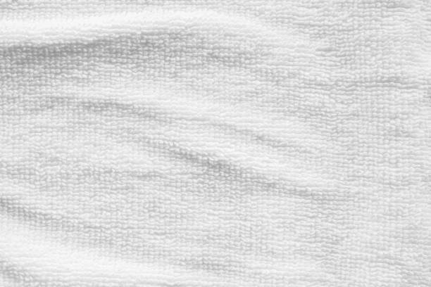 istock Closeup white cotton towel texture abstract background 1217268304