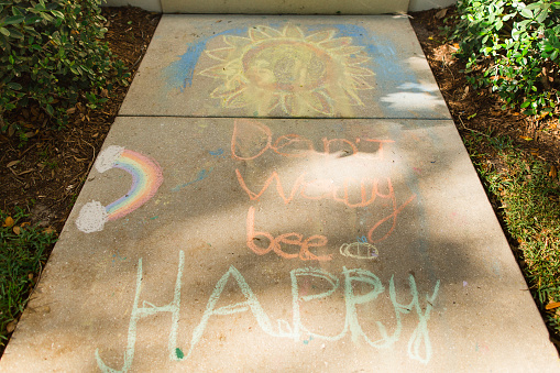 Covid-19 Inspirational Sidewalk Chalk Art. Colorful and creative sidewalk chalk art to inspire safety and hope during this uncertain time of the coronavirus of 2020.