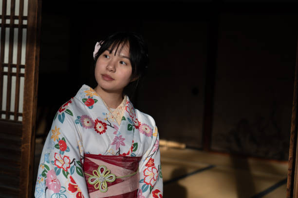 istock Young lady in white kimono 1217270972