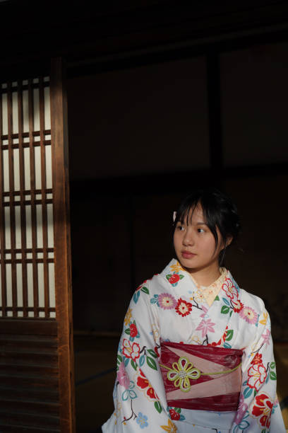 istock Young lady in white kimono 1217270975