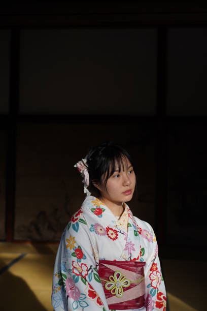 istock Young lady in white kimono 1217270978