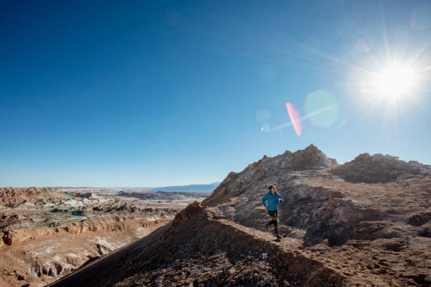 istock Woman trail running in the desert 1217277570