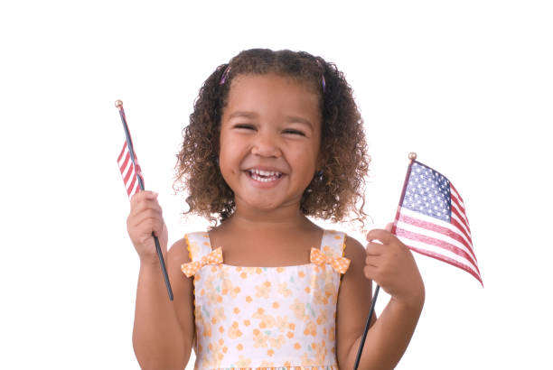 istock Girl holding American flags 121727918