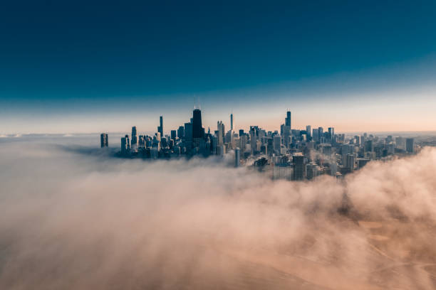 istock Chicago Cityscape and Low Clouds - Dramatic Aerial View 1217280410