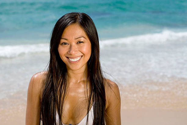 istock Beautiful Woman on the Beach 121728065