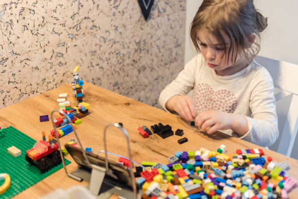 istock Little girl learning from home. 1217286594