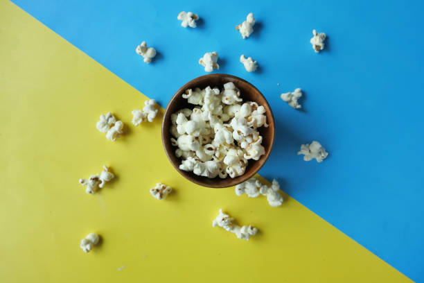 istock top view of popcorn in a bowl on color background 1217286597