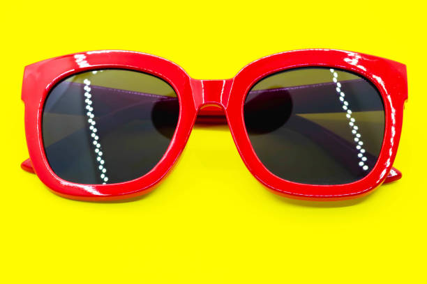 red sunglasses fashion on yellow background