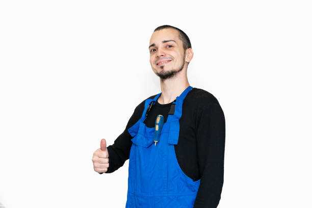 istock Professional repair, installation and maintenance technician. In a work suit 1217304198