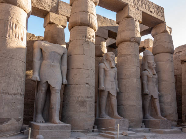 istock Standing colossal statues of Ramesses II at Luxor Temple 1217304589