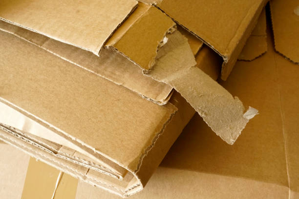 istock Close-up of stacked corrugated cardboard. Sheets of brown corrugated cardboard. 1217304708