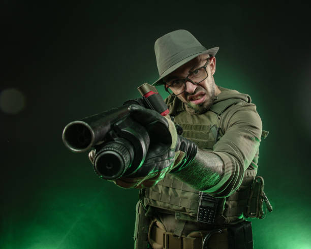 istock the hero is a guy in a hat with a shotgun 1217305424