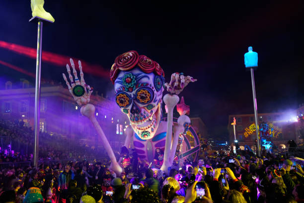 Nice, France - February 15, 2020 -- From 15 to 29 February 2020, For two weeks before COVID, Nice was world capital of fashion, with the 136th Nice Carnival on the theme “King of Fashion”. Admire the King and Queen and their subjects, in the extravagant parades of floats, grosses têtes (giant puppet heads).Over two weeks in February, the Nice Carnival, with its night parade, Corsi Carnavalesques portraying fashion in all its guises.