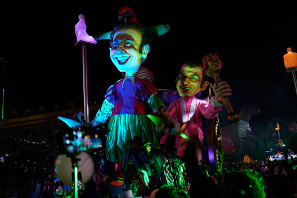 Nice, France - February 15, 2020 -- From 15 to 29 February 2020, For two weeks before COVID, Nice was world capital of fashion, with the 136th Nice Carnival on the theme “King of Fashion”. Admire the King and Queen and their subjects, in the extravagant parades of floats, grosses têtes (giant puppet heads).Over two weeks in February, the Nice Carnival, with its night parade, Corsi Carnavalesques portraying fashion in all its guises.