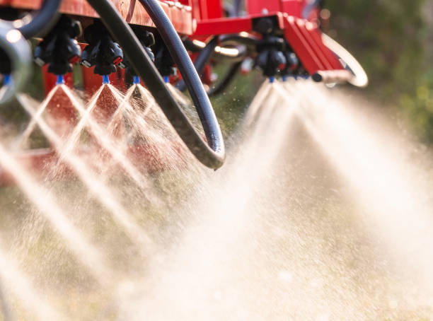 istock Nozzle of the tractor sprinklers sprayed. 1217307027