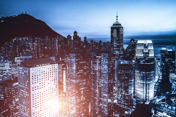 istock Drone view on Hong Kong City by night 1217307094