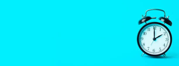 istock Time background concept. Vintage classic alarm clock on blue empty background. Time management comcept 1217308098