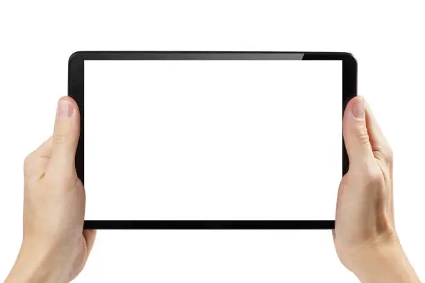 Photo of Black tablet computer in male hands on white