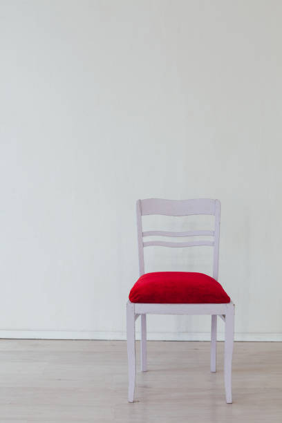 istock one chair in the interior of a white empty room 1217311583