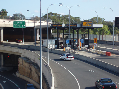 Sydney, Australia, January 29, 2006: View of toll booths and traffic entering and exiting on the city side of the Sydney Harbour Bridge
