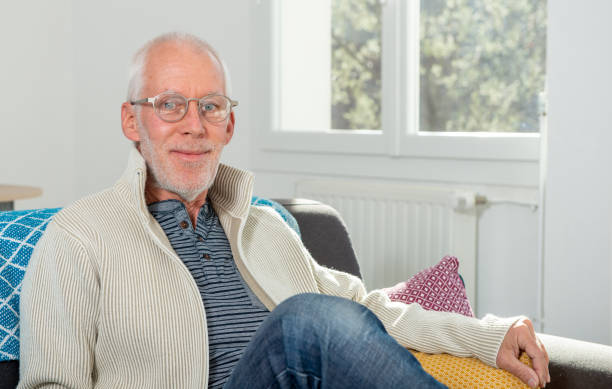 istock Senior man with grey hairs wearing eyeglasses 1217318383