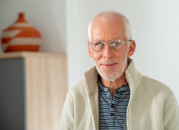 istock Senior man with grey hairs wearing eyeglasses 1217319309