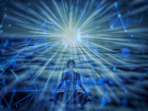 istock Silhouette of a person meditating 1217322156