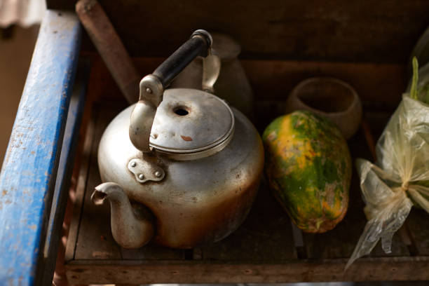 istock A teapot is in an Asian and simple kitchen and gets a little light from the side 1217322314