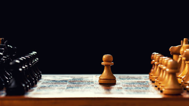 istock Vintage wooden chess board and figures 1217322962