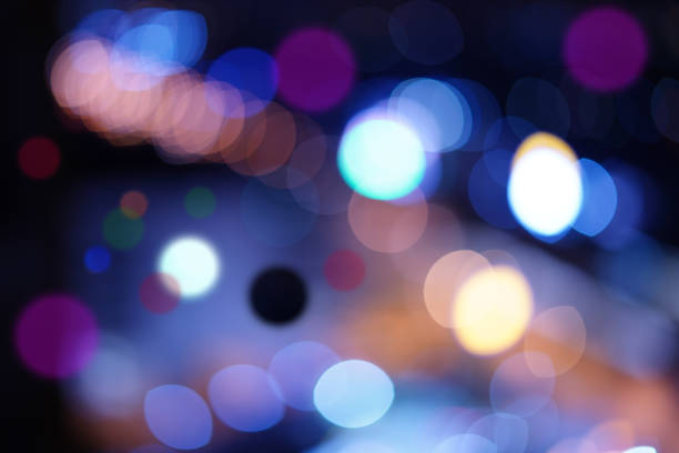 istock The orange, light blue, purple Blur bokeh, multicolored oval pattern dark background 1217323204