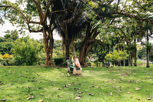 istock Girl chilling in the park 1217326725