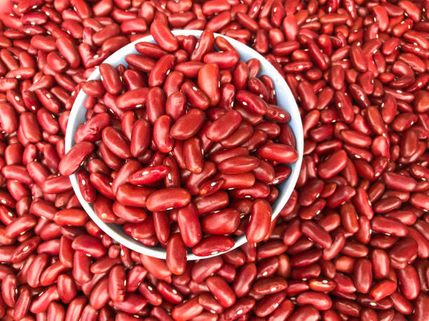 Red beans in a container Red beans in a container kidney bean stock pictures, royalty-free photos & images