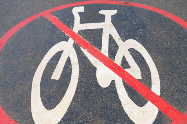 istock No cycling zone symbol on pavement 1217331974