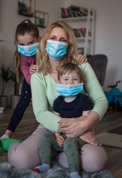 istock With a smile we fight the virus. 1217332734