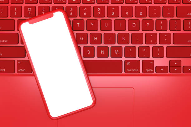 istock Smart Phone on Laptop, Minimal Technology Concept 1217333148
