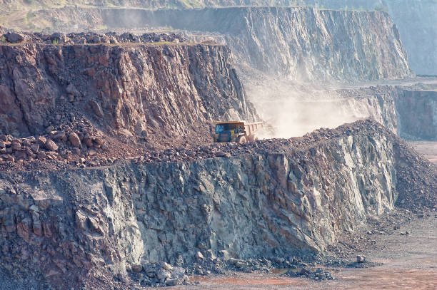 istock Quarry mine. Dumper truck driving around. 1217333262