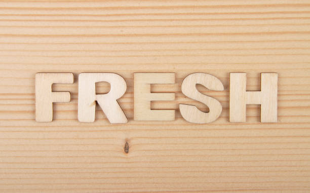 Term from wooden letters on pale wood