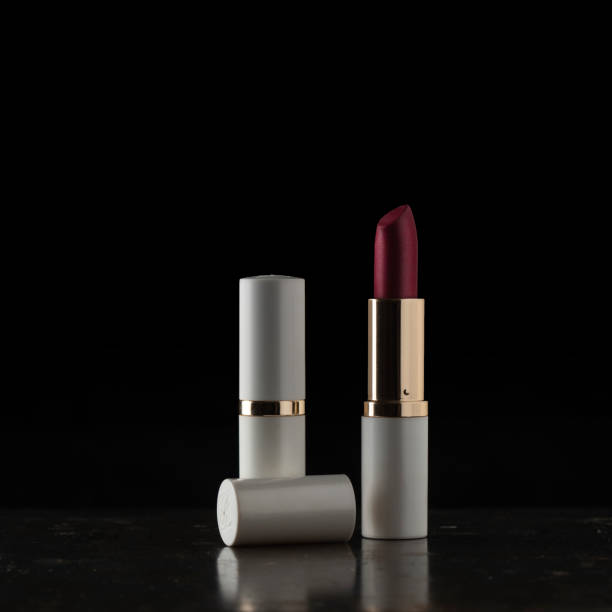 istock Cosmetic lipstick on a black background. 1217334583