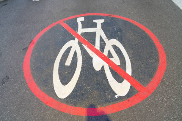 istock No cycling zone symbol on pavement 1217335073