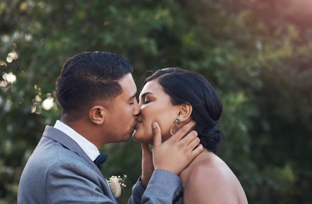 istock Sharing a kiss as Mr. and Mrs. 1217335787