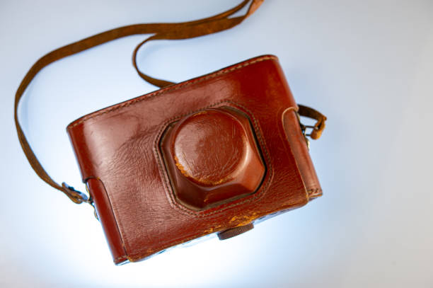 istock Vintage leather case of a rangefinder camera on a light background. 1217338269