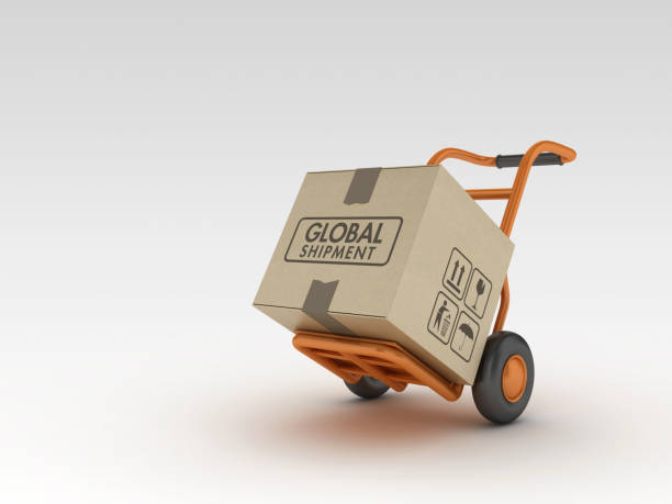 istock Hand Truck and Cardboard Box with GLOBAL SHIPMENT Label - 3D Rendering 1217339105
