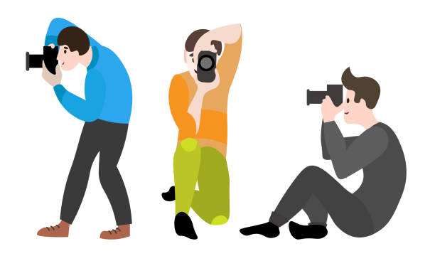 istock Set of different male and female photographers in different action poses. Vector illustration in a flat cartoon style. 1217339245