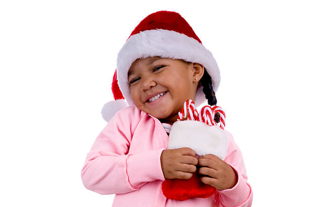 Young girl holding some candy canes.\n\n[url=http://bit.ly/ufP80j][img]http://nicolesyoung.com/istock/lightboxes/christmaswinter.png[/img][/url]\n\n[url=http://bit.ly/sQ2o2Q][img]http://nicolesyoung.com/istock/lightboxes/arayaprince.png[/img][/url]\n\n[url=http://bit.ly/sbl0UN][img]http://nicolesyoung.com/istock/lightboxes/happychildren.png[/img][/url]\n\n[url=http://bit.ly/tpTBhL][img]http://nicolesyoung.com/istock/lightboxes/whitebackground.png[/img][/url]