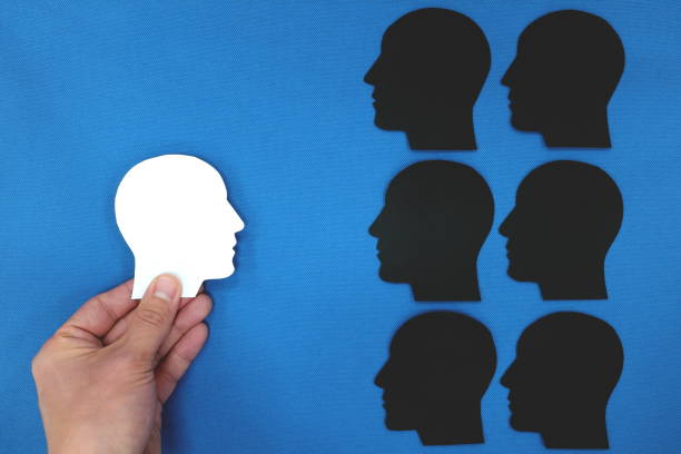 istock White male head silhouette profile facing shadow. Face fear, cope with stress and depression 1217343873