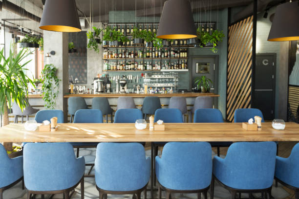 istock Modern cafe with places for rest and eating with big counter 1217346625