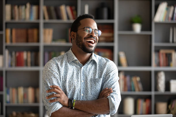 istock Smiling biracial man have fun in pleasant conversation 1217351036