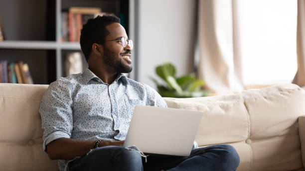 istock African American man look in distance dreaming 1217351092