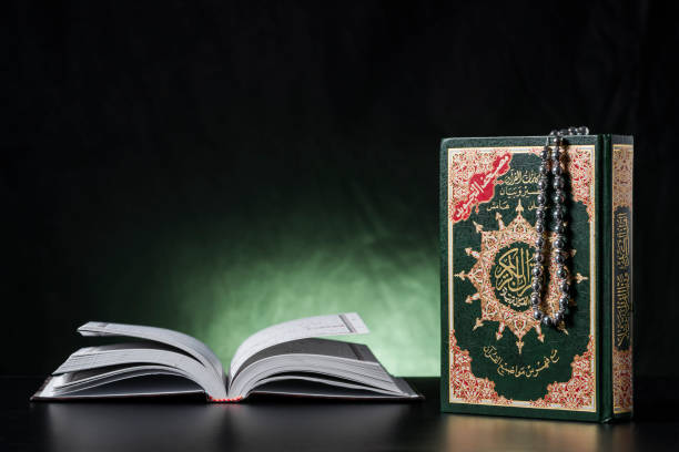 istock Quran Holy Book Closed and Open 1217351673