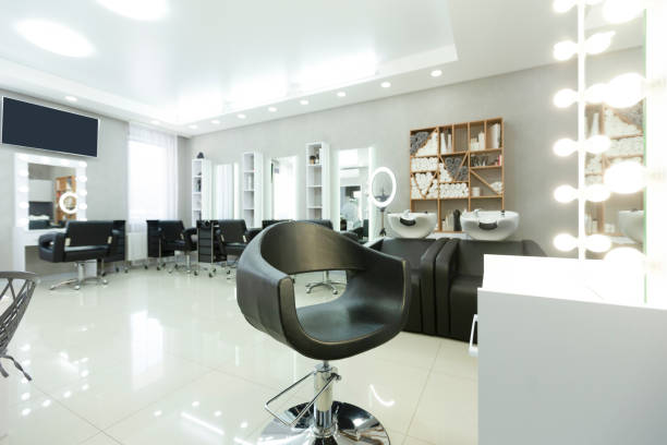 istock Empty hair saloon with chairs and mirrors 1217354966